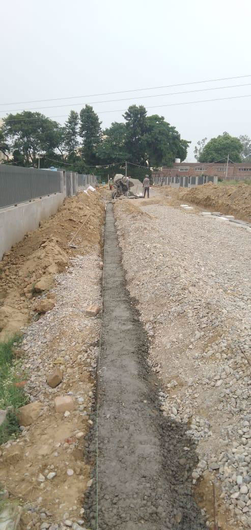 Laying of PCC for Flat Channel at Phase 2 Roads